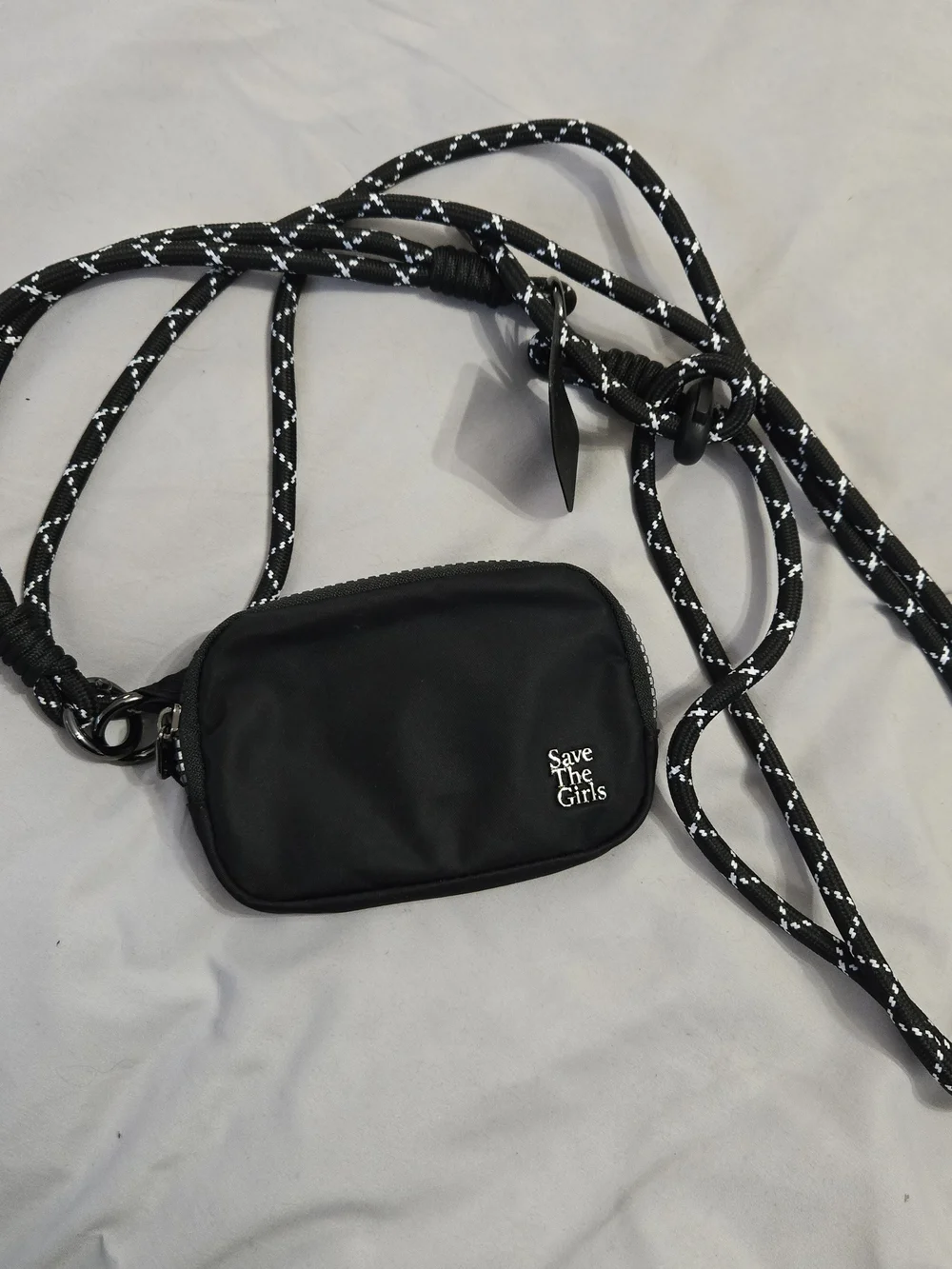 The Girls Black Crossbody Phone Pouch with Black & White Strap
